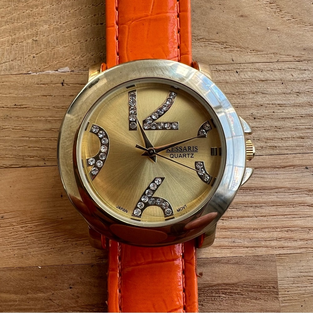 Kessaris ladies gold tone orange fashion Watch NEW BATTERY